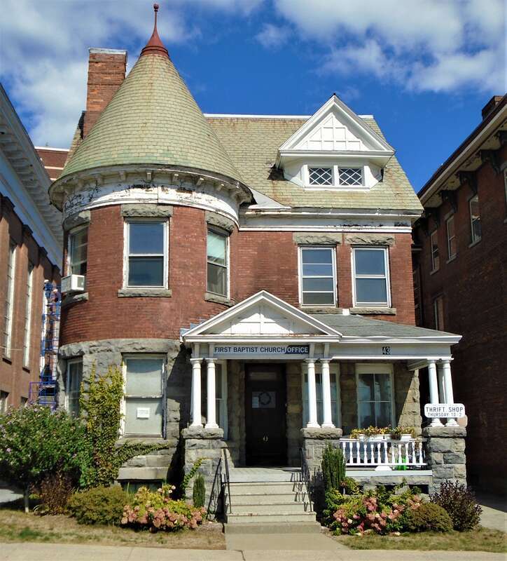 The First Baptist Church of Saratoga, located at 45 Washington Street at the corner of Railroad Place in Saratoga Springs, New York, was built in 1855 in the Gothic Revival style.  The stained glass windows, which are being restored, date from 1906.