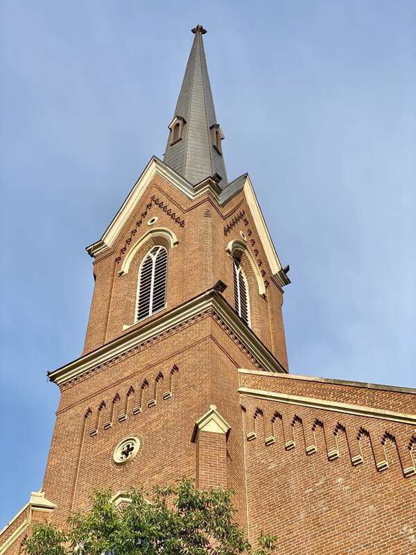 Built in 1874, this Gothic Revival-style building was designed by Cincinnatius Shryock for the congregation of the First Presbyterian Church of Lexington, founded as Mount Zion Church in 1784.  The building features a red brick exterior, a rough-hewn