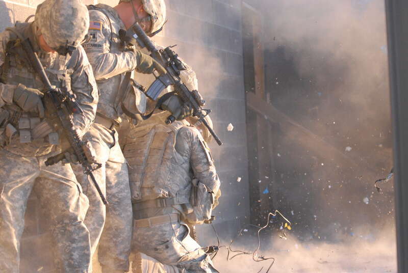Officers of 1st Stryker Brigade Combat Team, "Ready First" 1st Armored Division, participate in an urban combat exercise at a training facility on Fort Bliss, Texas, May 11-12.
1st Stryker Brigade Combat Team, 1st Armored Division
Photo by Staff Sgt.
