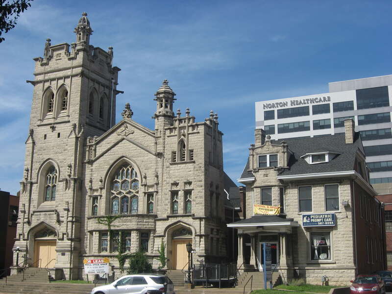Front of St. Paul's German Evangelical Church and its rectory, located at 213 E. Broadway (U.S. Route 150) in downtown Louisville, Kentucky, United States.  Built in 1906, it is listed on the National Register of Historic Places.