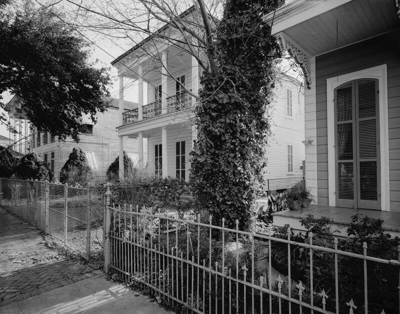 Street view of houses on the western side of the 1000 block of Fourth Street in New Orleans, Louisiana, United States.  This block is part of the Irish Channel Area Architectural District, a historic district that is listed on the National Register