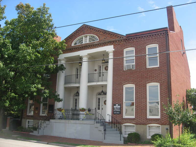 Front of the Grisamore House, located at 111-113 W. Chestnut Street in downtown Jeffersonville, Indiana, United States.  Built in 1837, it is listed on the National Register of Historic Places, and it is part of a Register-listed historic district,