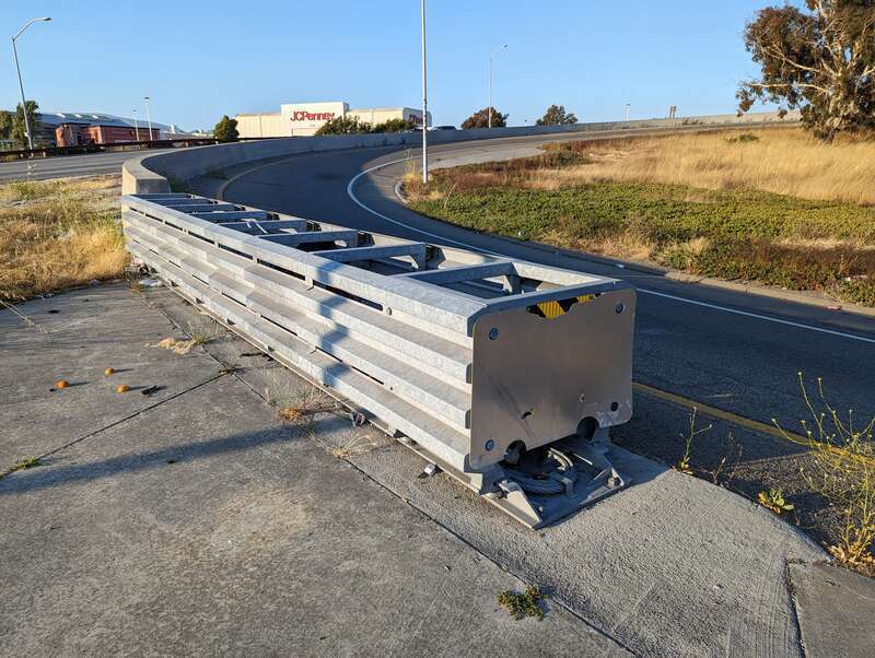 Impact attenuator near the Tanforan Shopping Center in San Bruno, California. This is next to a freeway on ramp from El Camino Real.