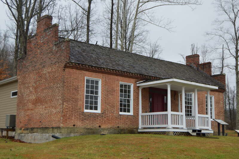 Front and northeastern end of the James W. Hoge House, located behind the Putnam County Courthouse in Winfield, West Virginia, United States.  Built in 1838, it is listed on the National Register of Historic Places.