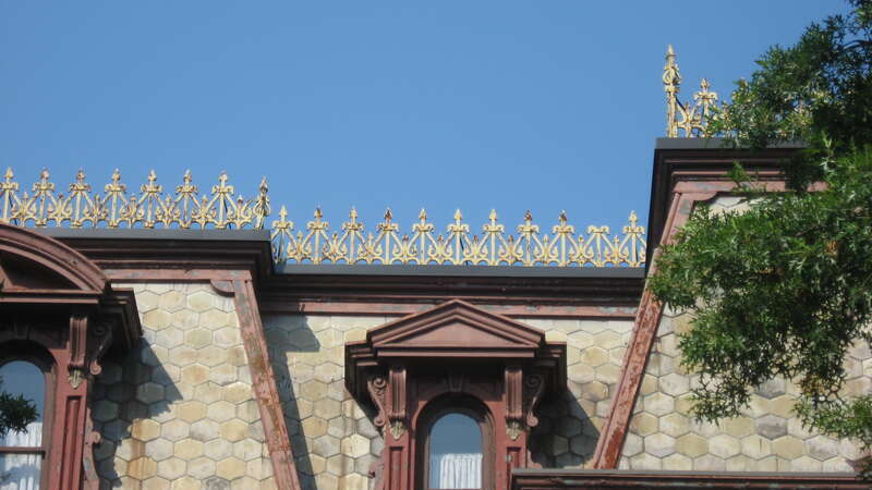 Decorative elements atop the front of the John Augustus Reitz House, located at 224 SE. First Street in Evansville, Indiana, United States.  Built in 1872, it is listed on the National Register of Historic Places, and it is part of a Register-listed