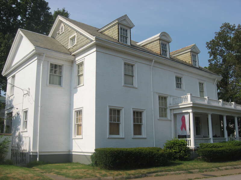 Front and western side of the John G. Shanklin House, located at 20 Adams Avenue in Evansville, Indiana, United States.  Built in 1895 to a design by Irving Kane Pond, it is part of the Riverside Historic District, a historic district that is listed