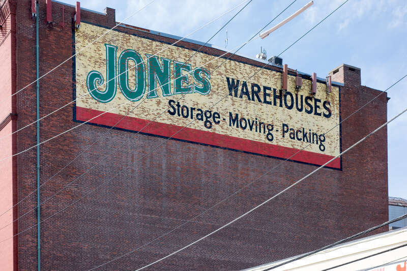 Painted sign on the side of Jones Warehouses, Providence, Rhode Island.