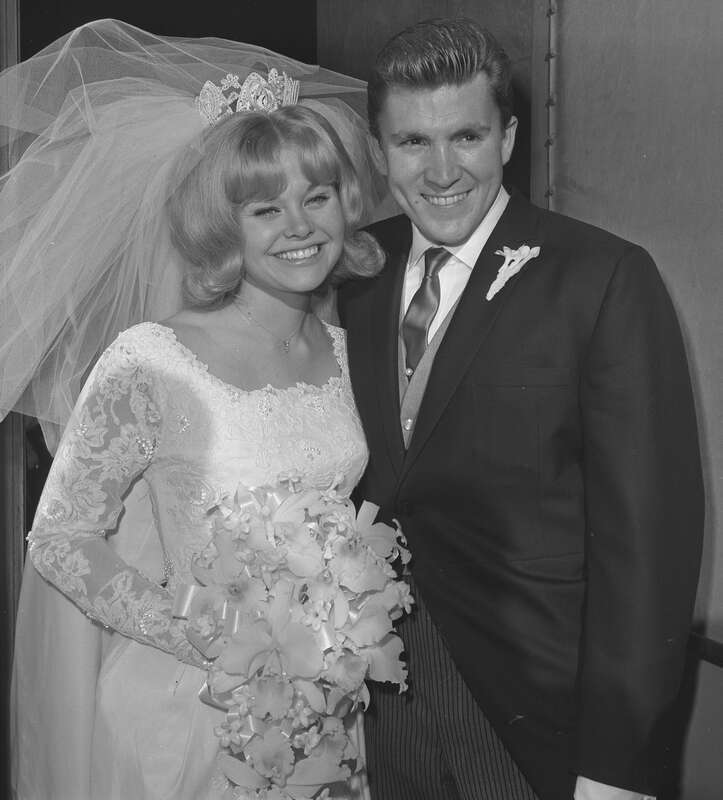 NEWLYWEDS-Lance Reventlow and his bride, actress Cheryl Holdridge, make a handsome pair at Westwood Community Methodist Church after their wedding before 600 invited guests. They planned a month-long Hawaii honeymoon.