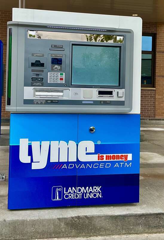 An automated teller machine for a Landmark Credit Union branch in Greenfield, Wisconsin, which uses the former "Tyme is money" branding prominent across the
