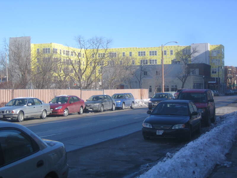 The Latitude Apartments building is clearly raising the height of the block. A notable increase in density from the two duplexs that were there previously.