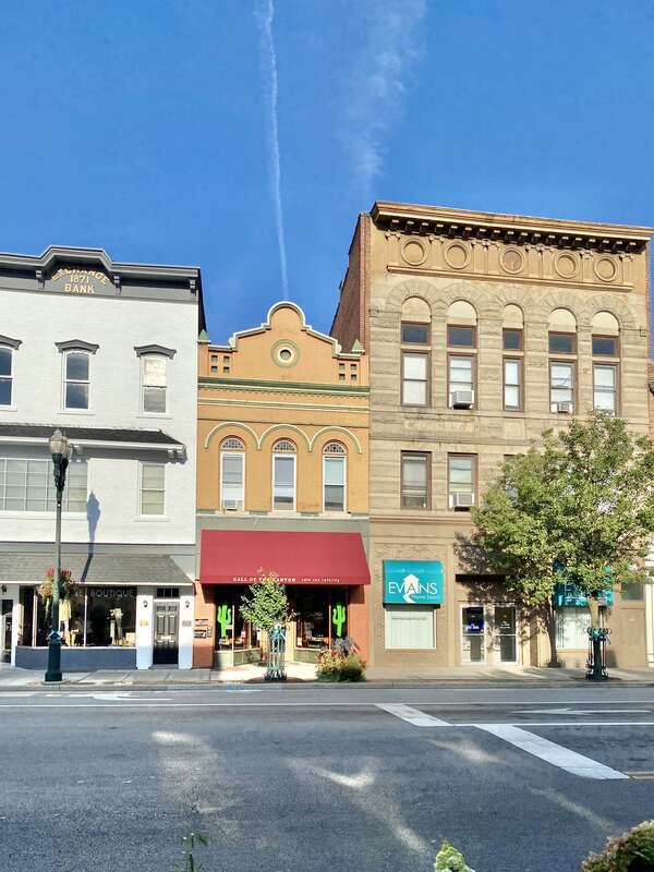 Built in the late 19th Century and early 20th Century, these buildings demonstrate styles popular in the time period, including Italianate, Queen Anne, and Classical Revival.  The buildings are contributing structures in the Main Street Historic
