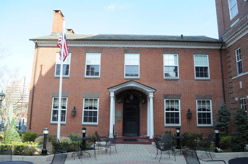 Tavern at the Armory, part of the Inn at Middletown (former State Armory), 70 Main Street, Middletown, Connecticut, USA.  The U-shaped combination building, built 1921, incorporates the John R. Watkinson House, built c. 1810, which is what you can