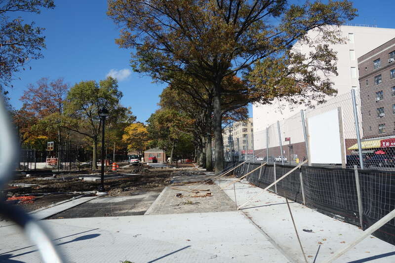 Looking into the south side of Clement Clarke Moore Homestead Playground, on 45th Avenue between Broadway and 82nd Street in Elmhurst, Queens. The entire park is undergoing a major reconstruction project. This area will become the "entry garden".