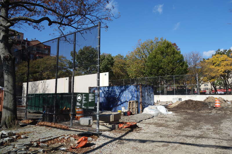 The entrance to the playing courts at the south end of Clement Clarke Moore Homestead Playground, on 45th Avenue between Broadway and 82nd Street in Elmhurst, Queens. The entire park is undergoing a major reconstruction project.