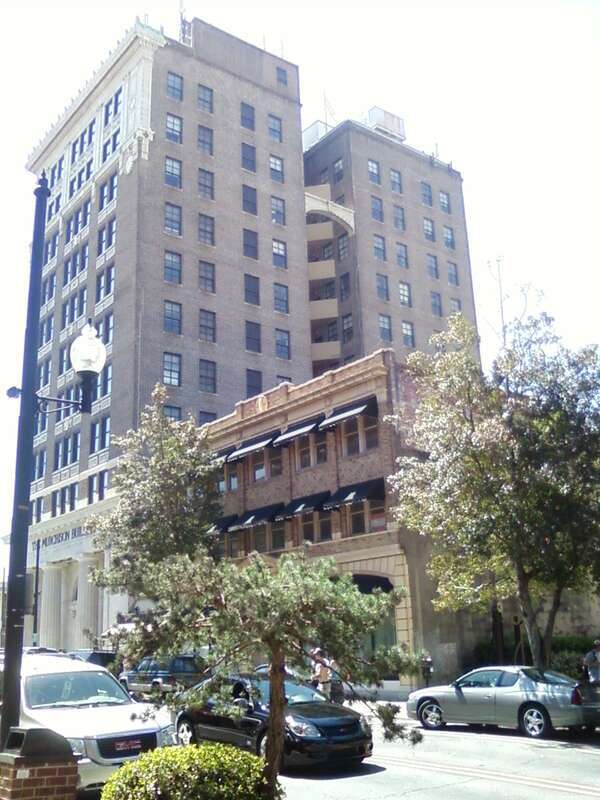 The Murchison Building in downtown Wilmington, NC. It is shot from the street level looking at the N. Front Street.