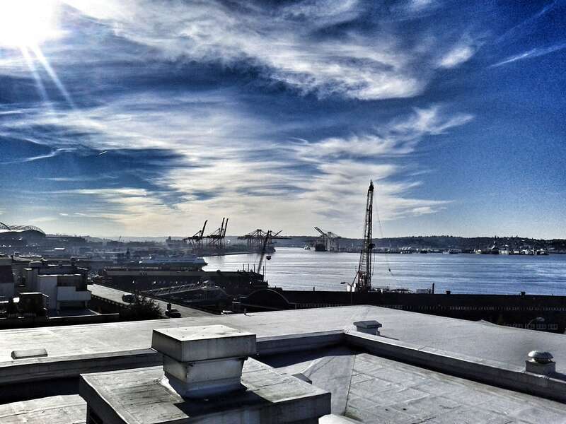 Looking roughly south by Pike Place Market toward Elliott Bay and Harbor Island in Seattle, Washington.