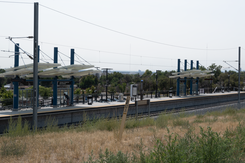 Original Thornton &amp; 88th RTD station viewed from northwest. Elements of the RTD Park &amp; Ride parking lot are visible in background.