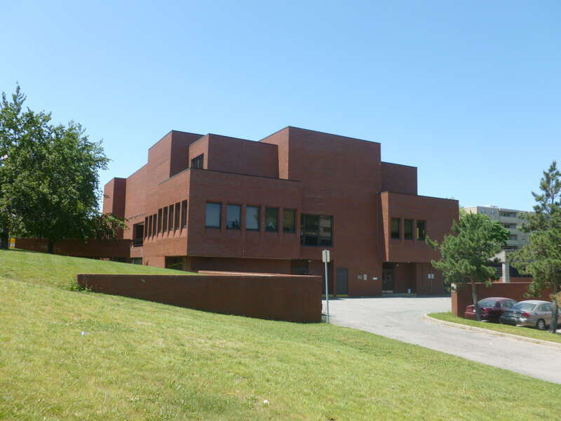 Quincy District Court, also known as District Court of Eastern Norfolk.  Located at 1 Dennis Ryan Parkway, Quincy, Massachusetts.  South (front) and east sides of building shown.