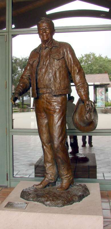 (1 in a 8-picture set)
This statue greets visitors. When one sees it and the many pictures in the library, you notice that he is almost smiling, full of confidence. He is shown in blue jeans and western wear, the way he was most comfortable.