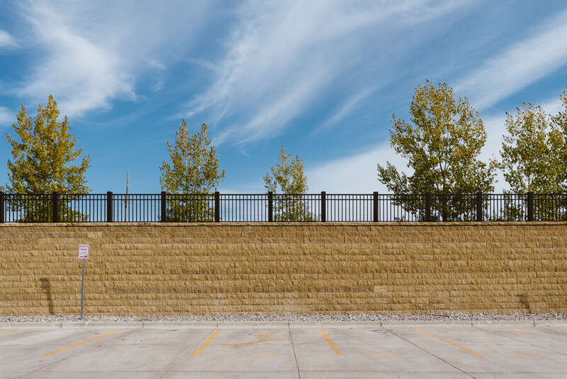 The city side of the flood walls in Grand Forks, North Dakota, block the view of the Red River - from a parking lot along the Red River in Grand Forks, North Dakota.