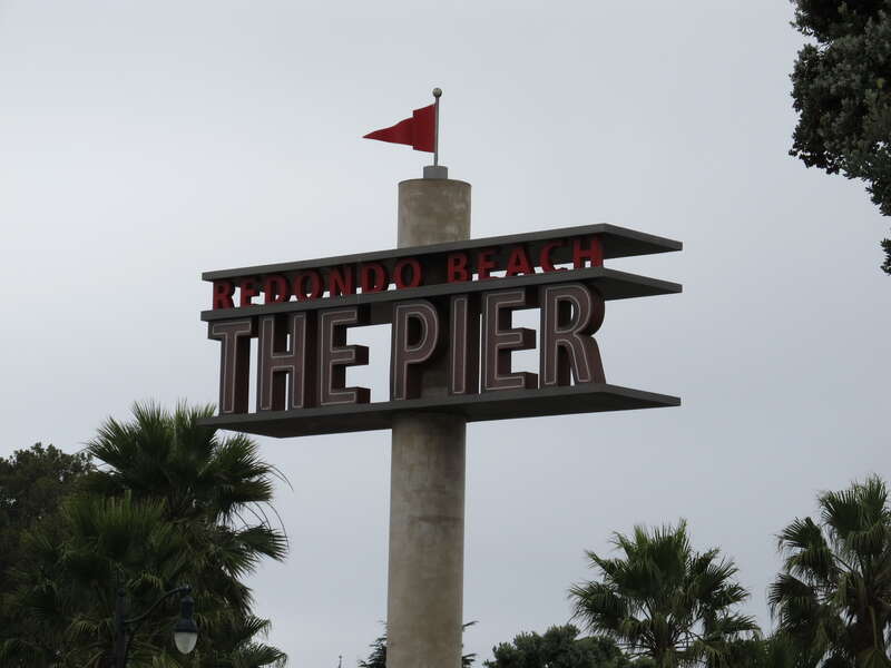 The Redondo Beach pier is located in Redondo Beach, California and stretches out onto the Pacific Ocean. The pier has been rebuilt and altered by storms and redevelopments. Its official name is "Municipal Pier", and it has also been called the
