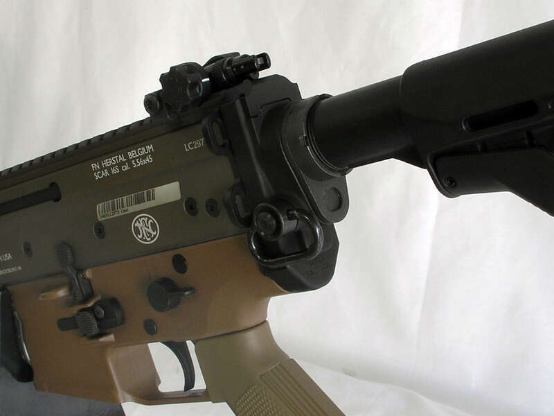The second version of the stock adapter for the FN SCAR, this one (probably the final one) includes ambidextrous steel push button sling swivel flush cups.