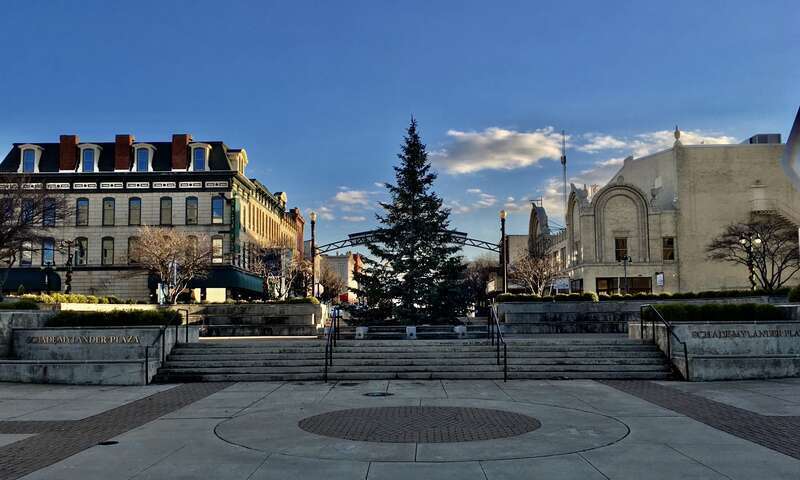 As seen in December 2020: downtown Sandusky's official Christmas tree display at Schade-Mylander Plaza. 2020's tree came from Washington Park, three blocks down Columbus Avenue, where it was "outgrowing its space" according to an article in the