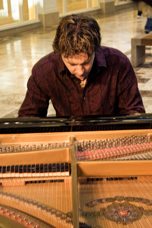 Scott D. Davis , a fantastic piano player performing at the Galleria in Roseville, CA.