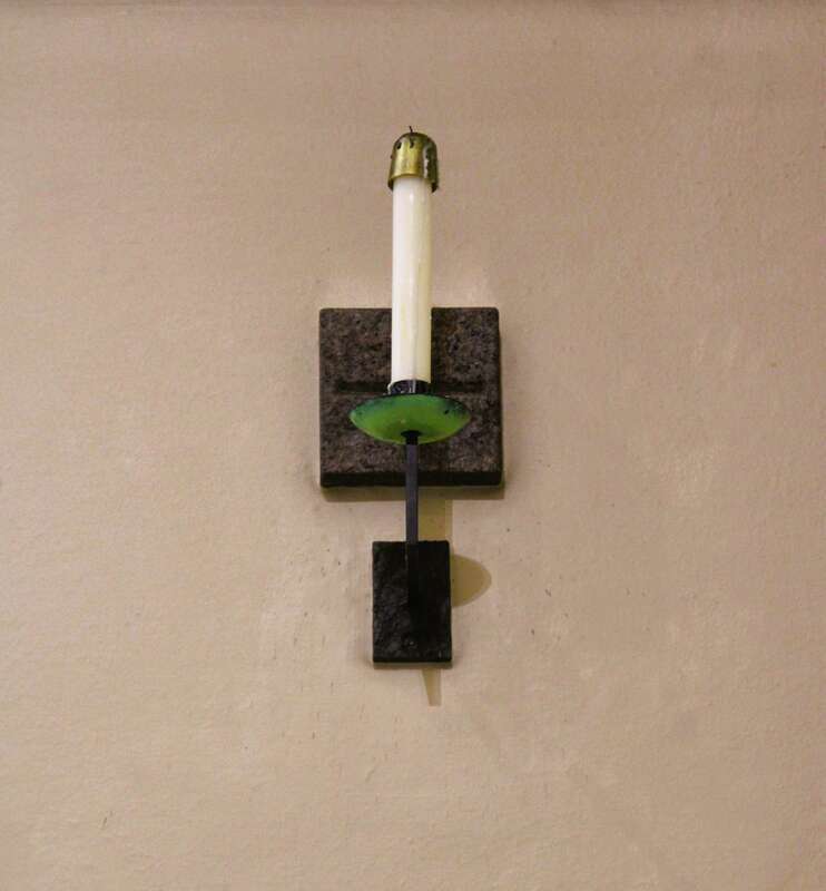 One of the consecration crosses and candles in Saint Mary Cathedral in Lansing, Michigan.