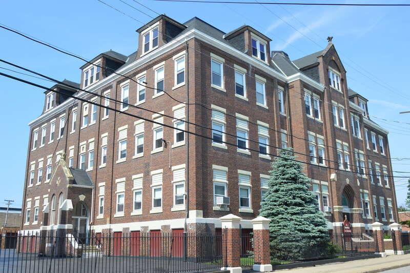Front and western side of the St. Stanislaus parish school, located on Forman Avenue just east of E. 65th Street in Cleveland, Ohio, United States.  The church complex lies at the heart of the old Polish neighborhood of Warszawa, later renamed