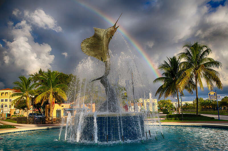 Stuart, Florida Sailfish Fountain with a well timed rainbow during the Scott Kelby Photowalk in October of 2013.