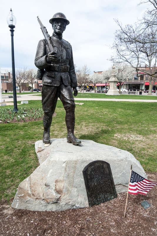 World War I "Doughboy" Statue Memorial on the south side of the Taunton Green. Massachusetts. "Erected in memory of all deceased comrades by the David F. Adams Post No. 611 Veterans of foreign Wars of the U.S.A. and their friends July 5, 1937"