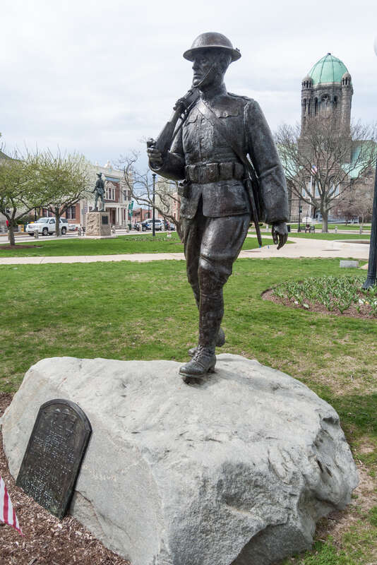 World War I "Doughboy" Statue Memorial on the south side of the Taunton Green. Massachusetts. "Erected in memory of all deceased comrades by the David F. Adams Post No. 611 Veterans of foreign Wars of the U.S.A. and their friends July 5, 1937"