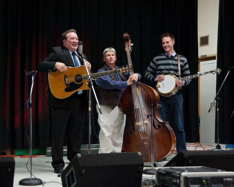 The Virginia Ramblers performing at the Lucketts Bluegrass in Lucketts, Virginia on December 10, 2011--Charles Frazier (guitar), Donnie Shifflett (stand-up bass), and Zack Deming (banjo).