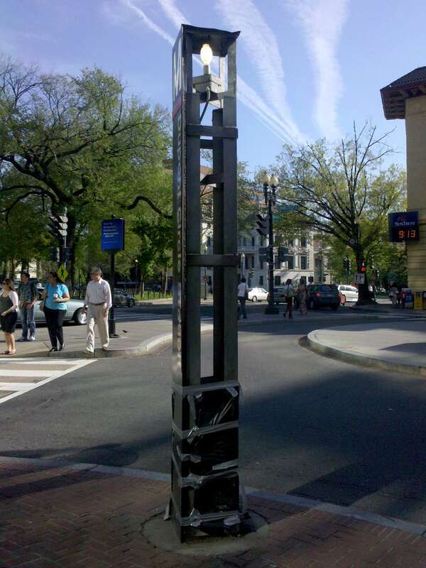 Station entrance pylon for the 19th Street (south) entrance to the Dupont Circle Metro station in Washington DC.  The pylon was missing three sides at the time that this photo was taken.

Ben Schumin is a professional photographer who captures the