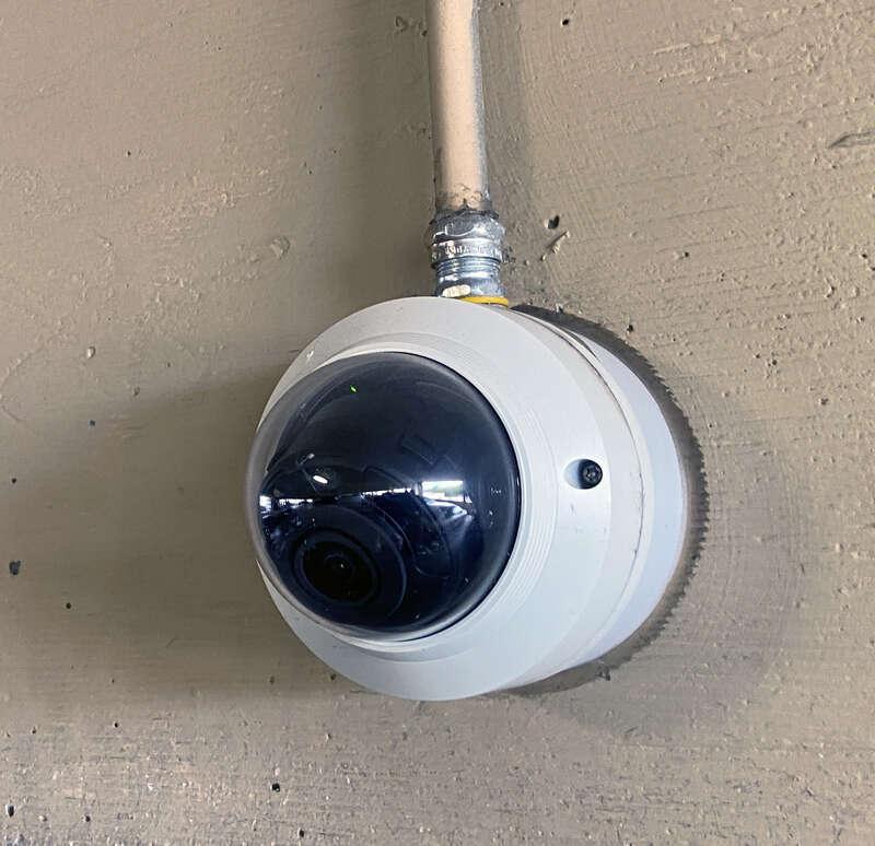 Vandal dome style security camera in a parking garage.
Mankato, Minnesota, USA