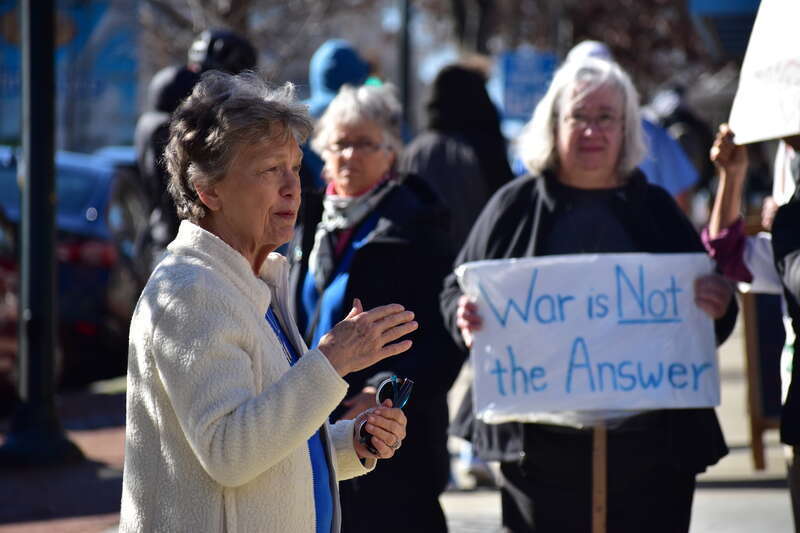 Over 50 people gather at Peace and Justice Plaza across the street from UNC-Chapel Hill to protest actions that might lead to a war with Iran.