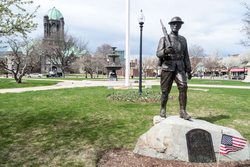 World War I "Doughboy" Statue Memorial on the south side of the Taunton Green. Massachusetts. "Erected in memory of all deceased comrades by the David F. Adams Post No. 611 Veterans of foreign Wars of the U.S.A. and their friends July 5, 1937"