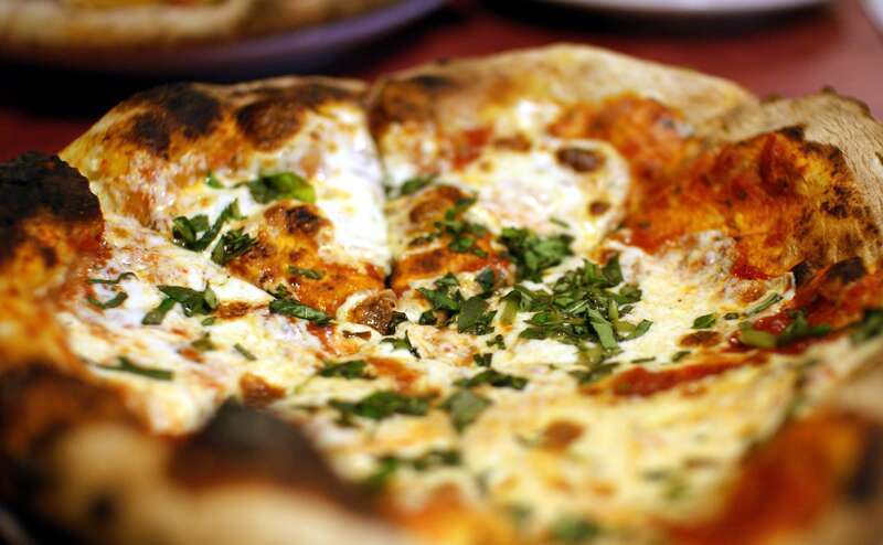 A Margarita pizza from Zeffiro's. Just the basics: tomatoes, mozzarella, and basil. From Las Cruces' new bakery/pizza joint, Zeffiro. It took much too long for a brick-oven pizza place to come to town.