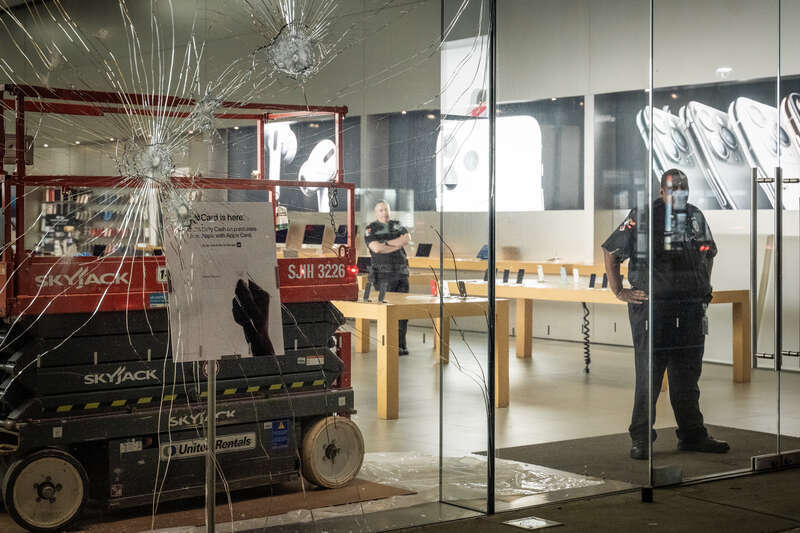 Private security inside the Apple Store on Hennepin Avenue in Minneapolis.
--
This photo is part of a continuing series covering the unrest and healing in Minneapolis following the May 25th, 2020 death of George Floyd. 
More photos: 
<a