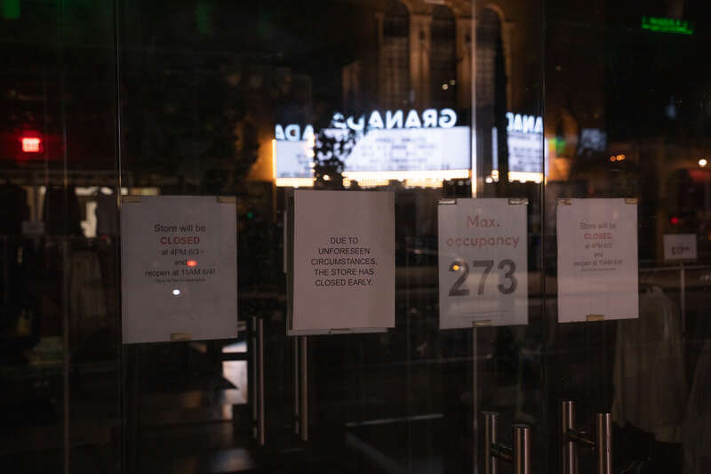 Signs on H&amp;M after Winston Smith was killed by law enforcement the day before a block away. Stores closed early over potential unrest in the area,