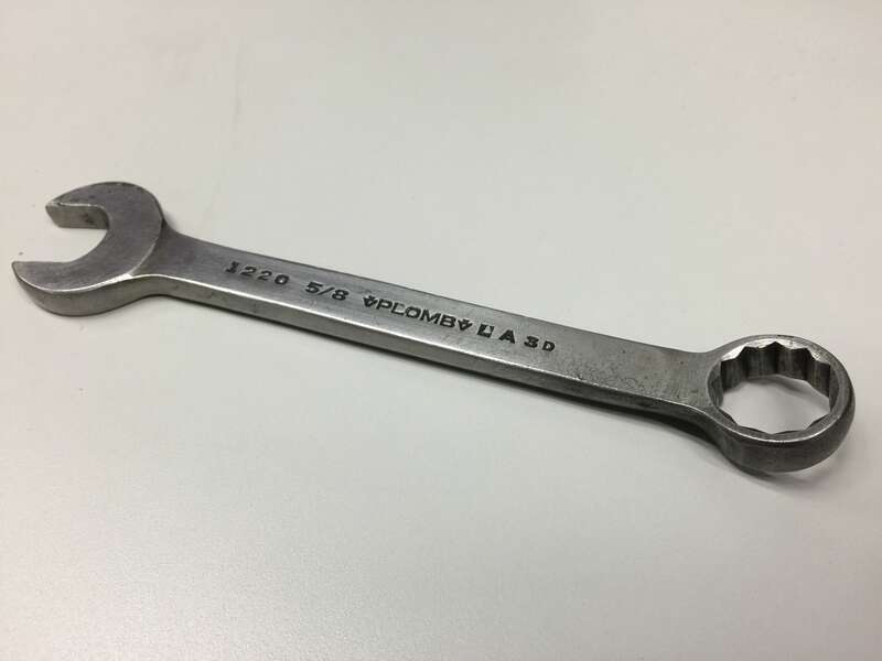 Photograph of a Plomb Tool Company 5/8" Combination wrench manufactured in 1933.