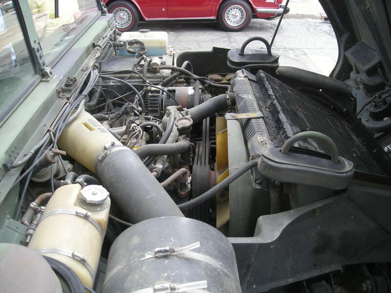 A 1987 AM General HMMWV engine at the 2014 Rolling Sculpture Car Show in Ann Arbor, Michigan (United States).