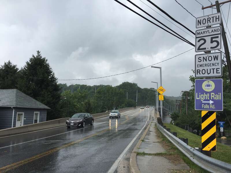 View north along Maryland State Route 25 (Falls Road) at Lakeside Drive in Towson, Baltimore County, Maryland