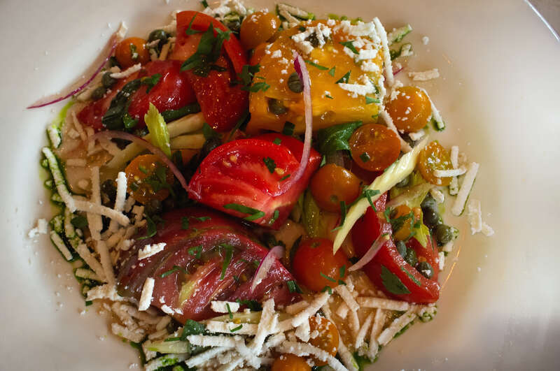 Jenny and I had the wonderful "20 Mile Tomato Salad" tonight at a packed Ollie irene restaurant in Mountain Brook, Alabama.  20 miles means basically "Buy Local" and everything was grown within 20 miles of the restaurant.  It was sooo good.