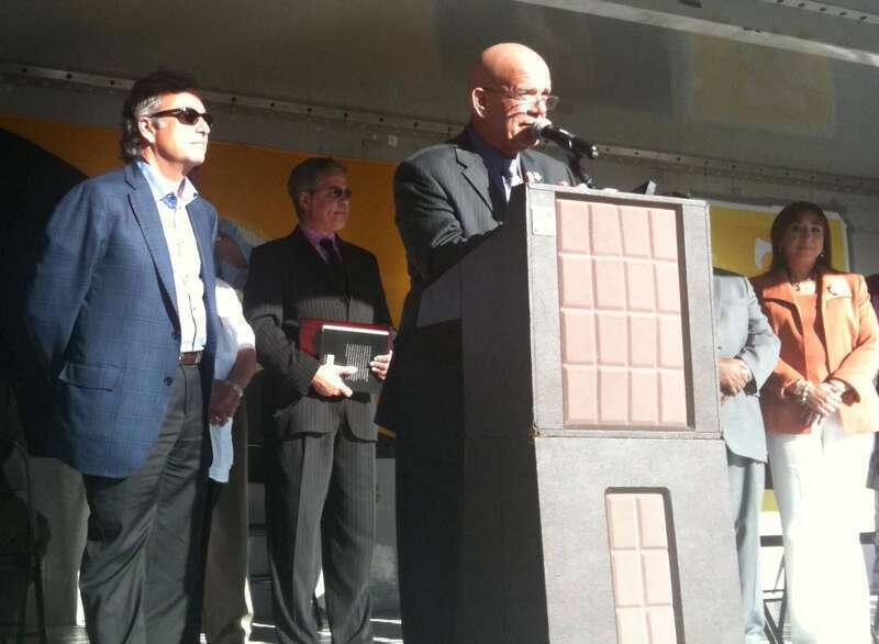 Radio broadcaster and Spanish Broadcasting System co-founder Raúl Alarcón, Jr. (left, in blue jacket) in Union City, New Jersey, where he accepted honors for his father, Pablo Raúl Alarcón, Jr., on June 2, 2011 with a star at the Celia Cruz Plaza