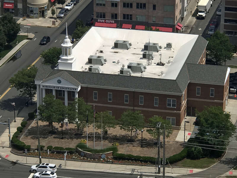 Edgewater Borough Hall on River Road in Edgewater, New Jersey, as photographed from the tenth floor rooftop deck of Hudson View Rehab and Care in North Bergen on July 30, 2021. 


This photo was created by Luigi Novi. It is not in the public domain,
