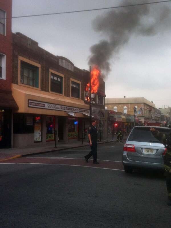 A fire at 4114 Bergenline Avenue in Union City, New Jersey on August 15, 2012. The fire started a short time before 12:45pm, when police officers first arrived on the scene, which was when I was passing by in a commuter van, and first saw what was