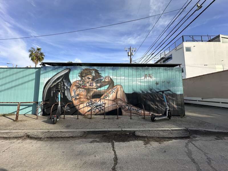 An illustration outside Roosterfish on Cadiz Court by Jules Muck.