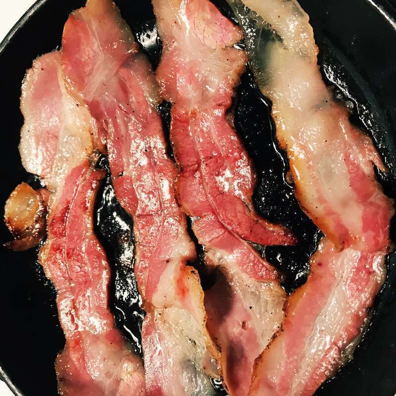 Bacon cooking in a pan